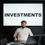 Robo-advisors automating investment portfolio management on a laptop.