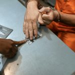 A person reading a guide on the expungement process.