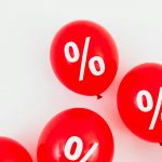 Illustration of financial inflation protection strategies with assets like I-Bonds and TIPS.