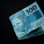 A person starting to invest with just $100.